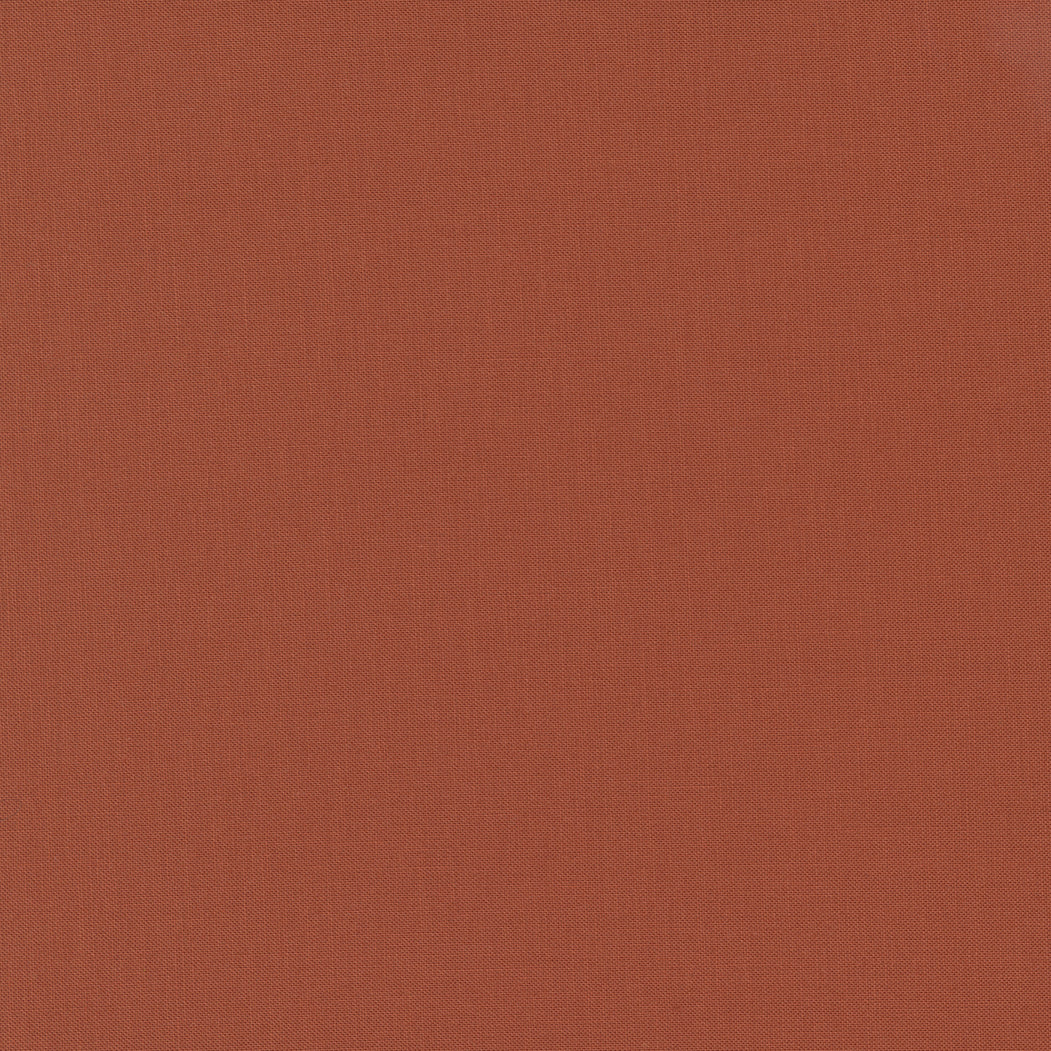 Bella Solids 9900-105 Rust ysivärinen puuvillakangas, ruskea