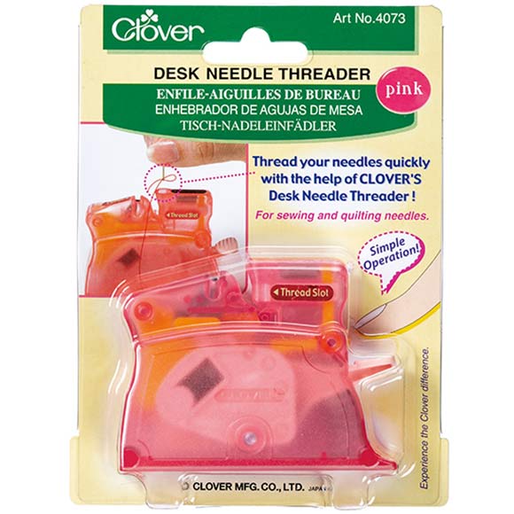 Clover Desk Needle Threader - vaaleanpunainen neulanlangoitin, jossa on automaattinen mekanismi ja langan leikkuri.