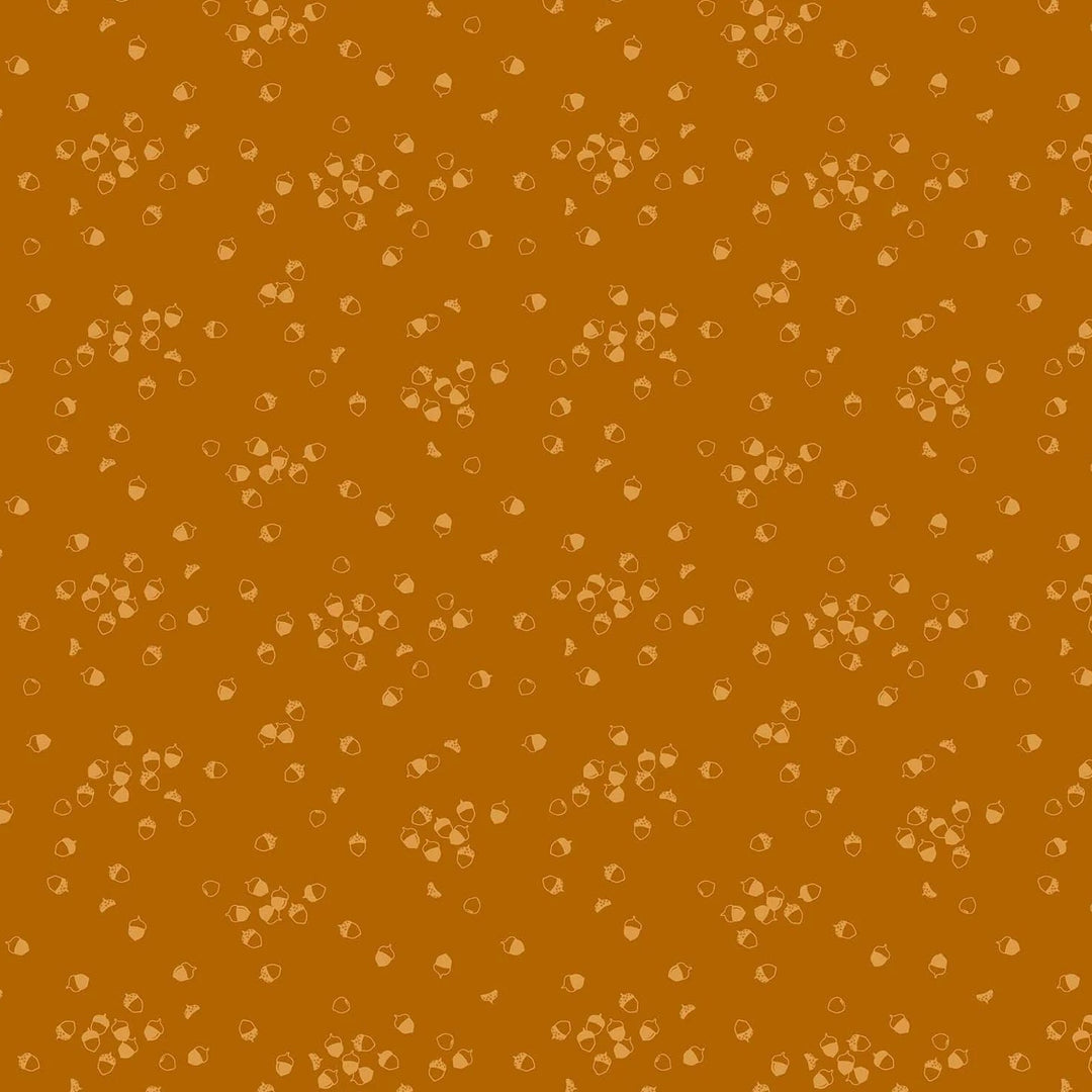 Vaaleanruskeapohjainen puuvillakangas, jossa pieniä tammenterhokuvioita. Ghazal Razavin suunnittelema Lucky Charms -kokoelman Acorn Rust -kangas Figo Fabricsilta.