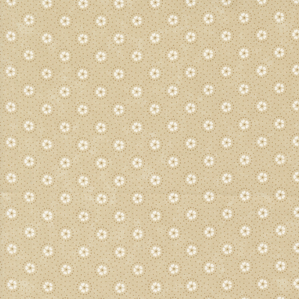 Kansas Troubles Quilters - Blackbird's Nest Daisies and Dots Tan Tonal puuvillakangas, jossa valkoisia kukkakuvioita ja pieniä pilkkuja beesin pohjalla.