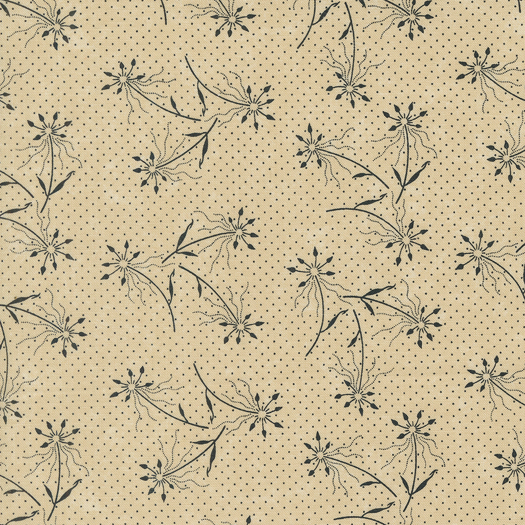 Kansas Troubles Quilters - Blackbird's Nest Dandelions Tan puuvillakangas, jossa mustia voikukkakuvioita ja pieniä pilkkuja lämpimän beigen pohjalla.