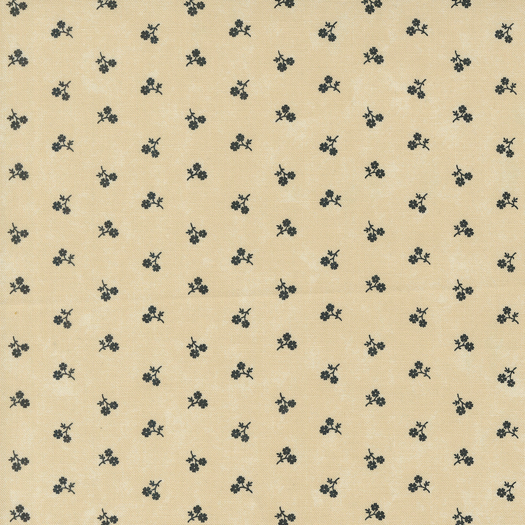 Kansas Troubles Quilters - Blackbird's Nest Petie Petals Tan puuvillakangas, jossa mustia pieniä kukkakuvioita beesin pohjalla.