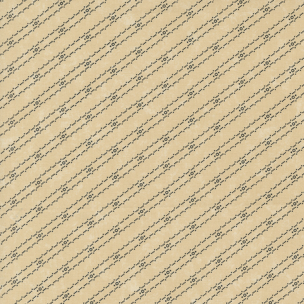 Kansas Troubles Quilters - Blackbird's Nest Bird Tracks Tan puuvillakangas, jossa mustia geometrisia raitakuvioita beigen pohjalla.