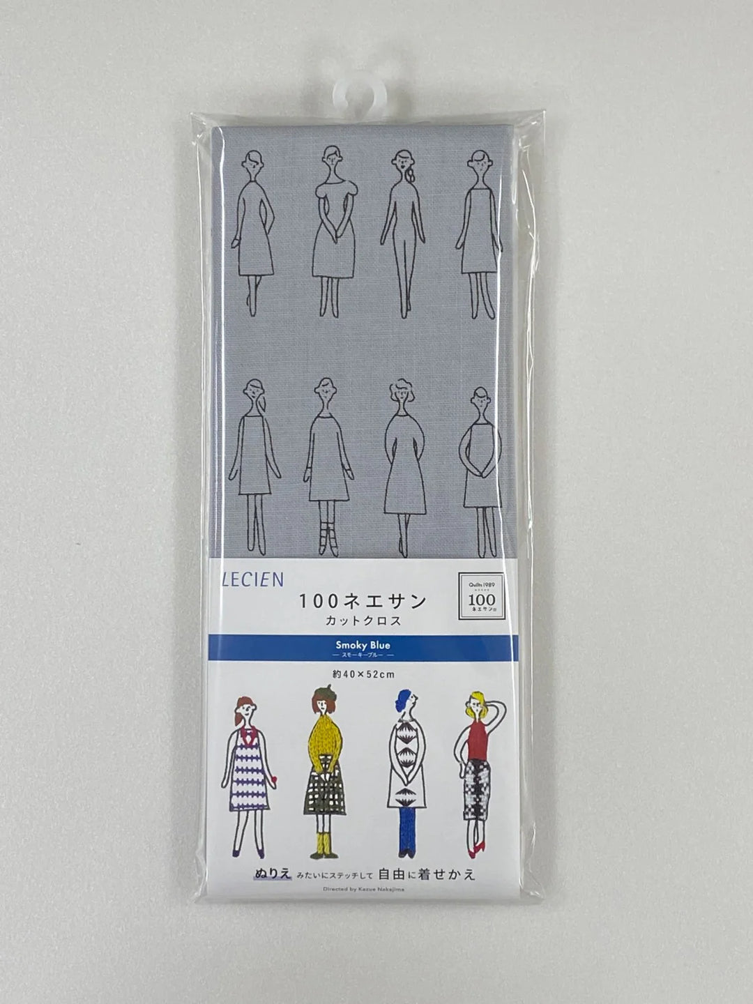 Lecien Cosmo 100 Ne-San -kirjontapaneeli, savunsininen kangas. Kazue Nakajiman 100 viivapiirrosta naisista koristeltavaksi. Inspiraatio: Quilts1989.