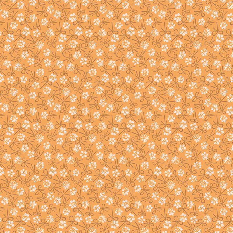 Lori Holtin Farmer's Daughter -kokoelman Bonnet Marigold -puuvillakangas. Keltainen pohja, geometrisiä kukkakuvioita, sopii tilkkutöihin ja käsitöihin.