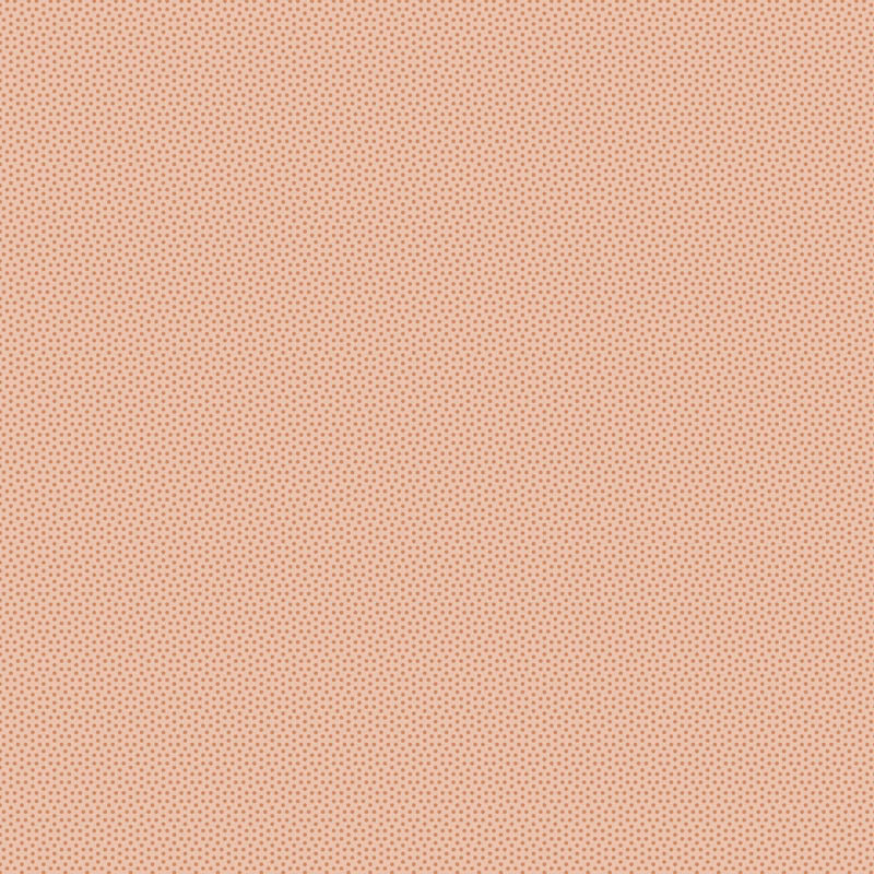 Tilda Poppy Seed Dusty Peach 130172 – terrakotan värinen puuvillakangas, jossa pieniä pilkkuja.