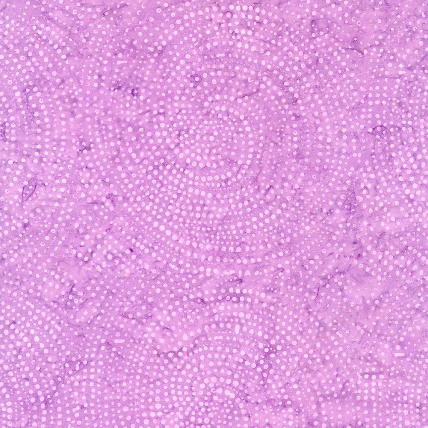 Tonga Batiks Pansy - Dotty Spiral Wisteria B2336 puuvillakangas batiikki, liilan ja vaaleanpunaisen sävyissä.