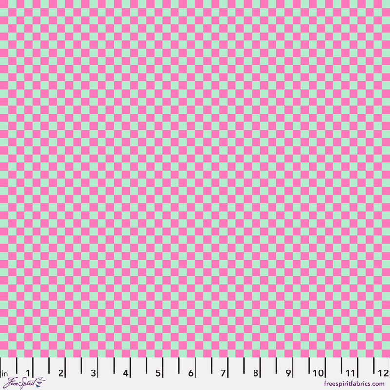 Check Please Cosmic: Tula Pinkin Untamed -kokoelman puuvillakangas neonkorostuksilla ja geometrisilla kuvioilla.