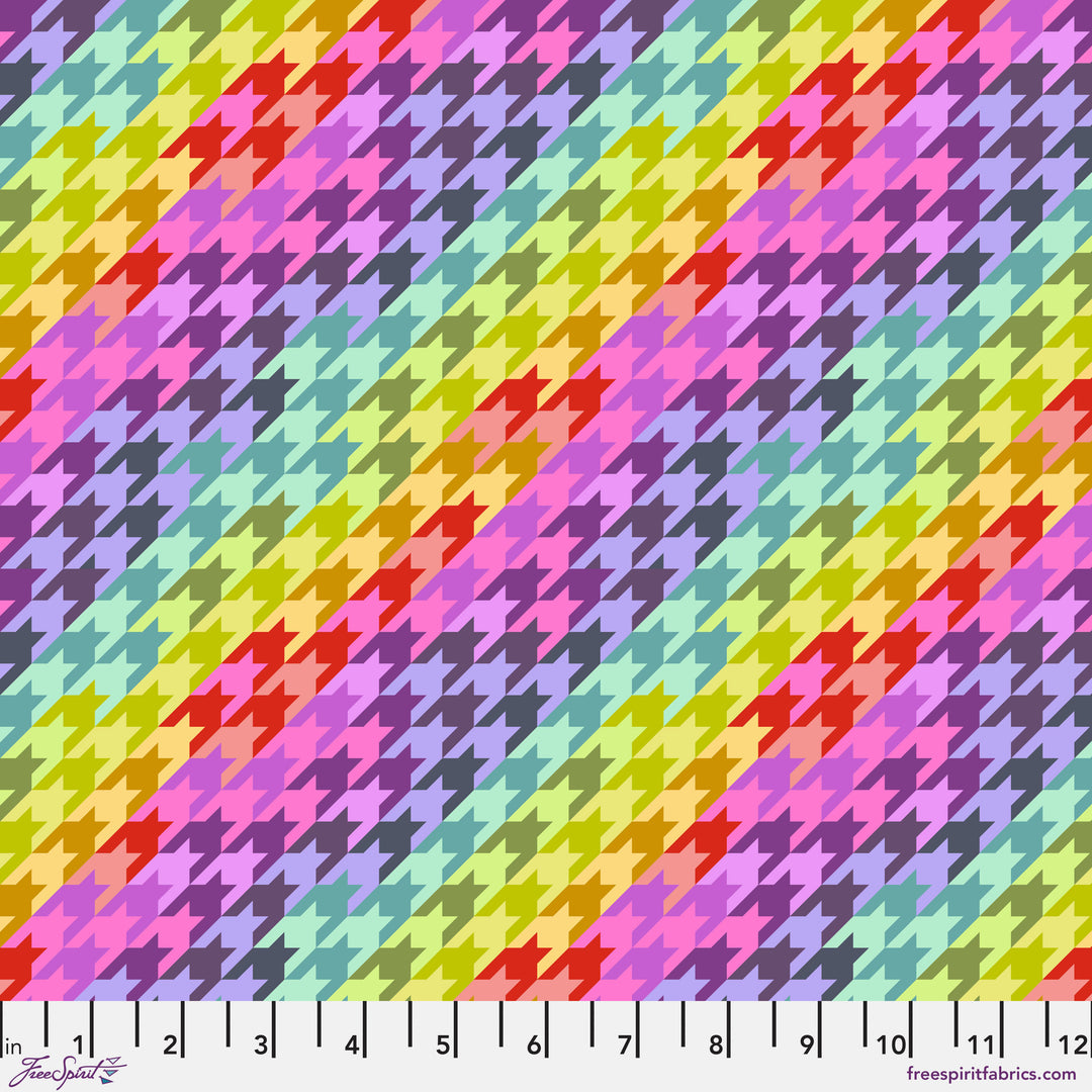 Sweet Tooth Cosmic kangas on Tula Pinkin Untamed -kokoelman geometrinenkuvioinen puuvillakangas neonkorostuksilla.