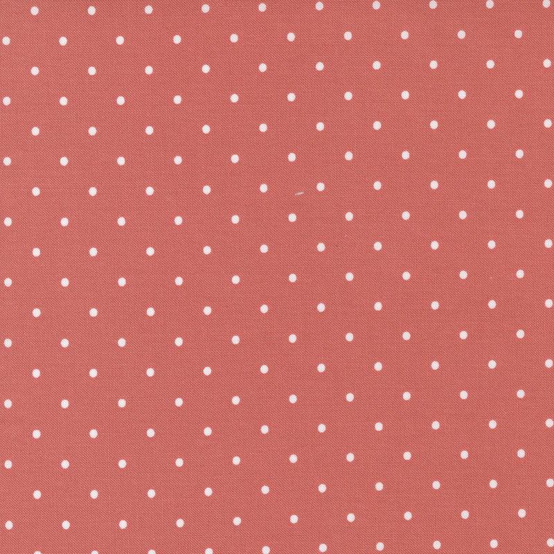 Lella Boutique Country Rose 5175-13 Tea Rose Magic Dot puuvillakangas, vaaleanpunainen tausta ja pienillä täplillä.