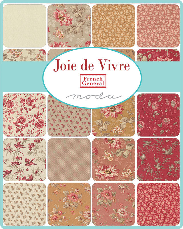 Joie de Vivre  French Generalilta. Kukka- ja lehtikuvioita punaisen ja beigen sävyissä. Valmistaja Moda Fabrics.