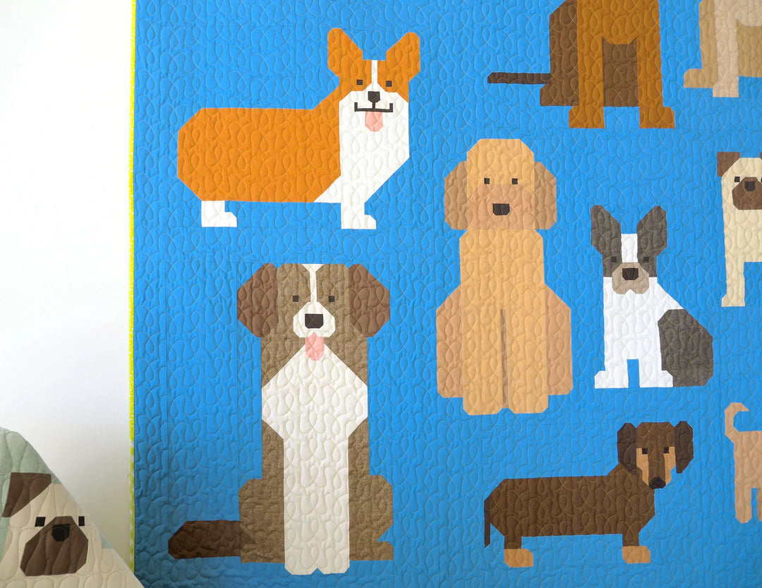 Elizabeth Hartmanin Dog Park EH-076 on paperinen tilkkutyöohje koirateemaiseen peittoon. 11 koiraa mallia.