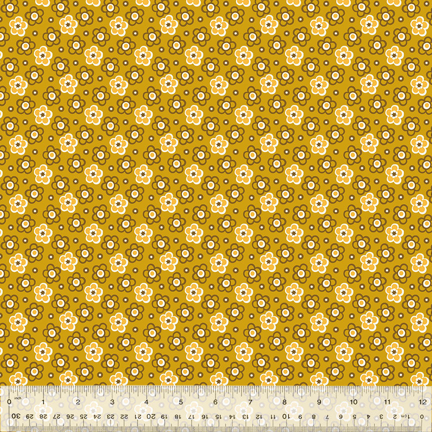 Denyse Schmidtin Bonny kokoelman Shadow Posy Ochre 53642-7 puuvillakangas – keltainensävyinen geometrisilla ja kukkakuvioitu kangas tilkkutöihin.