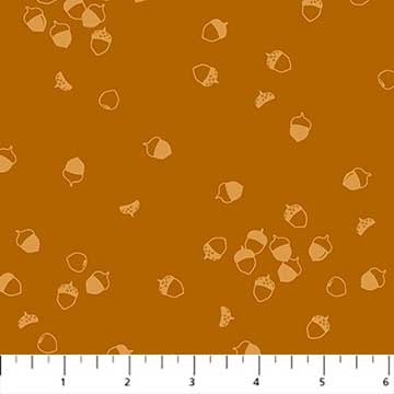 Vaaleanruskeapohjainen puuvillakangas, jossa pieniä tammenterhokuvioita. Ghazal Razavin suunnittelema Lucky Charms -kokoelman Acorn Rust -kangas Figo Fabricsilta.