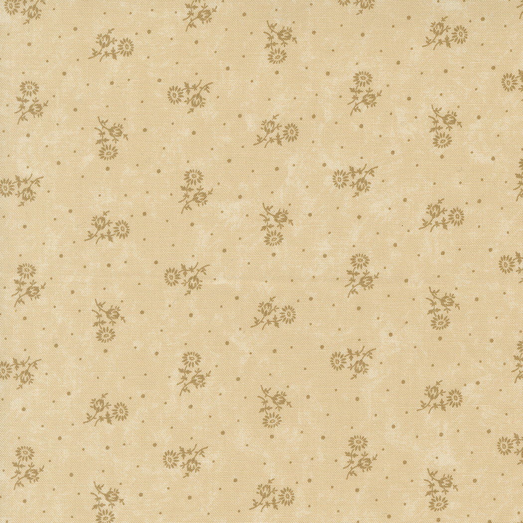 Kansas Troubles Quilters - Blackbird's Nest Thistle Tan Tonal puuvillakangas, jossa vaalea kukkakuvioita ja pieniä pilkkuja beesin pohjalla.