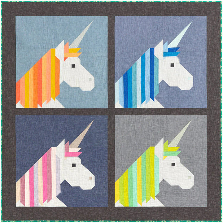 Tilkkutyöpeitto, jossa sateenkaaren värinen yksisarvinen. Malli: Lisa the Unicorn – suunnittelija Elizabeth Hartman.