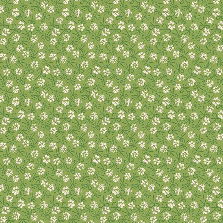 Lori Holtin Farmer's Daughter -kokoelman Bonnet Thyme -puuvillakangas. Viheä pohja, geometrisiä kukkakuvioita, sopii tilkkutöihin ja käsitöihin.