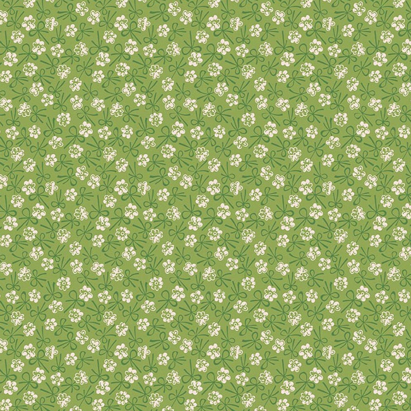 Lori Holtin Farmer's Daughter -kokoelman Bonnet Thyme -puuvillakangas. Viheä pohja, geometrisiä kukkakuvioita, sopii tilkkutöihin ja käsitöihin.