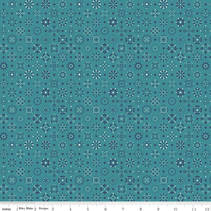 Lori Holtin Farmer's Daughter -kokoelman Handmade Raindrop -puuvillakangas. Sinertävä pohja, geometrisiä kuvioita, sopii tilkkutöihin ja käsitöihin.