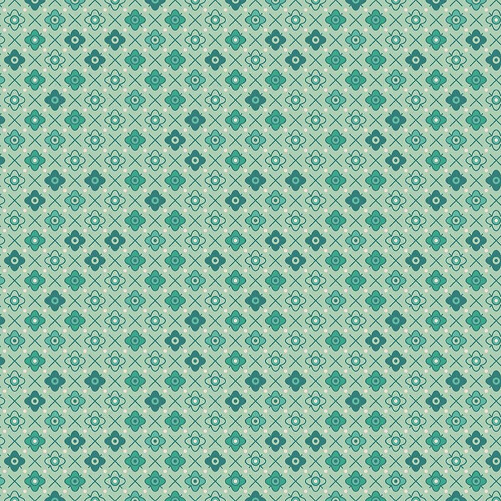 Lori Holtin Farmer's Daughter -kokoelman Flower Patch Sage -puuvillakangas. Vaaleanvihreä pohja, geometrisiä kukkakuvioita, sopii tilkkutöihin ja käsitöihin.