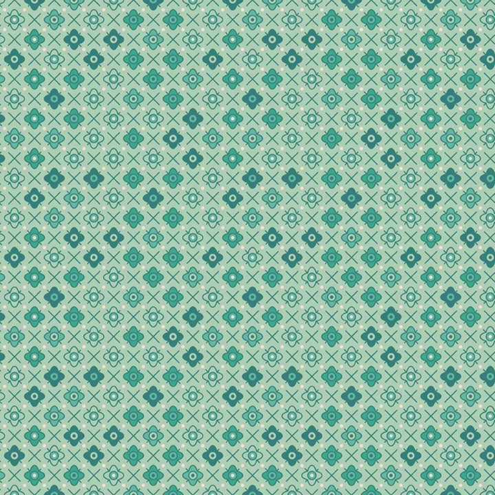 Lori Holtin Farmer's Daughter -kokoelman Flower Patch Sage -puuvillakangas. Vaaleanvihreä pohja, geometrisiä kukkakuvioita, sopii tilkkutöihin ja käsitöihin.