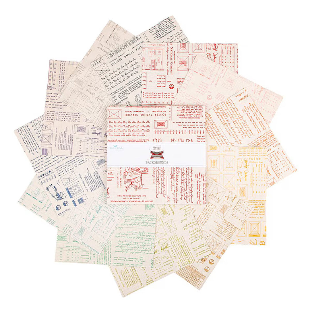 Lori Holt Type/ography B Layer Cake -kangasnippu, 42 esileikattua 10 tuuman neliötä typografisissa kuoseissa.