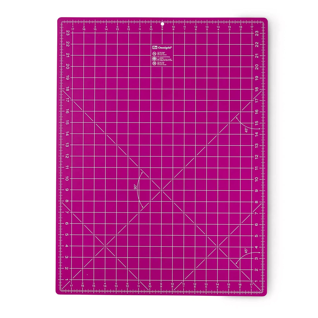 Omnigrid leikkuualusta 60×45 cm magenta – suuri itsekorjautuva leikkuualusta sentti- ja tuumamitoilla tilkkuiluun ja ompeluun.