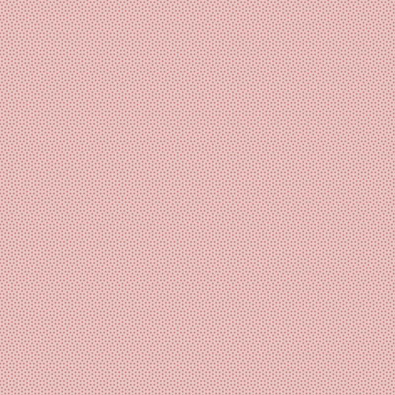 Tilda Poppy Seed Dusty Rose 130184 – vaaleanpunainen puuvillakangas, jossa pieniä pilkkuja.