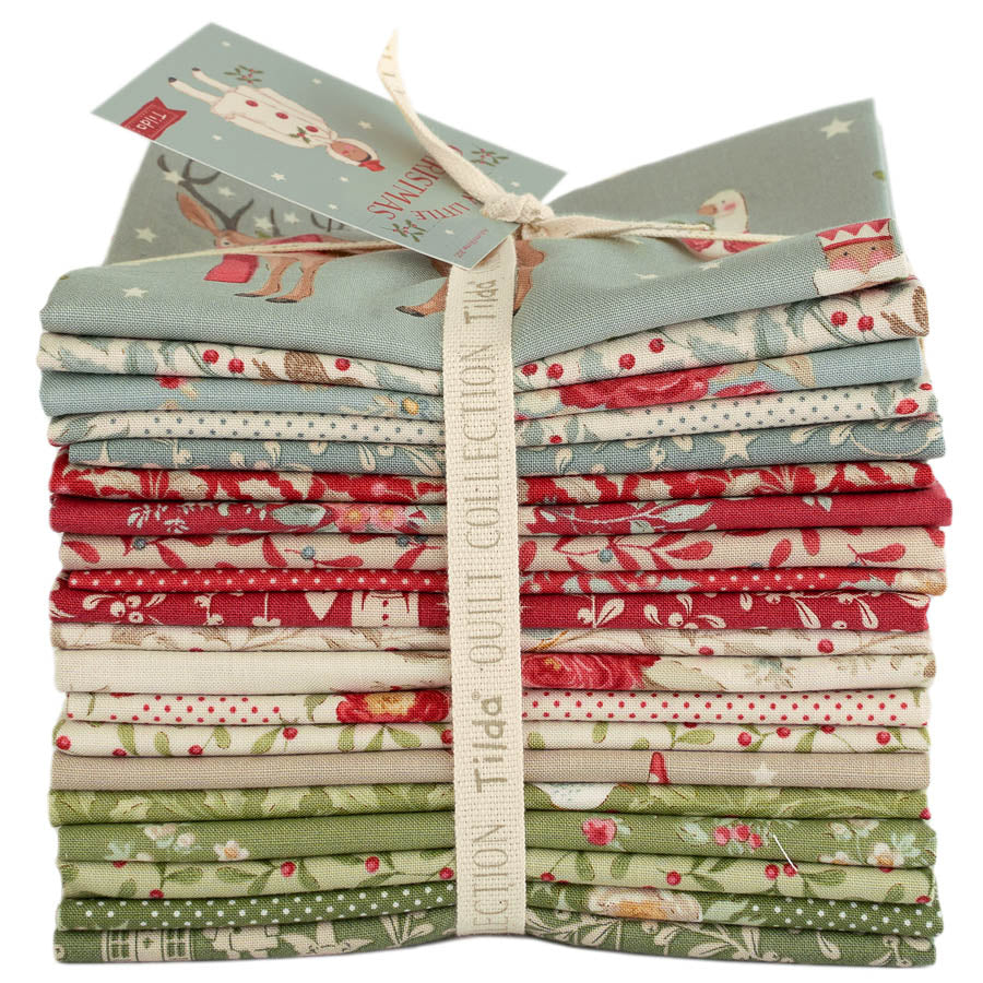Tilda Merry Little Christmas -kokoelman kukkakuvioinen Fat Quarter -kangasnippu. Täydellinen joulun tilkkutöihin tai ompeluprojekteihin.