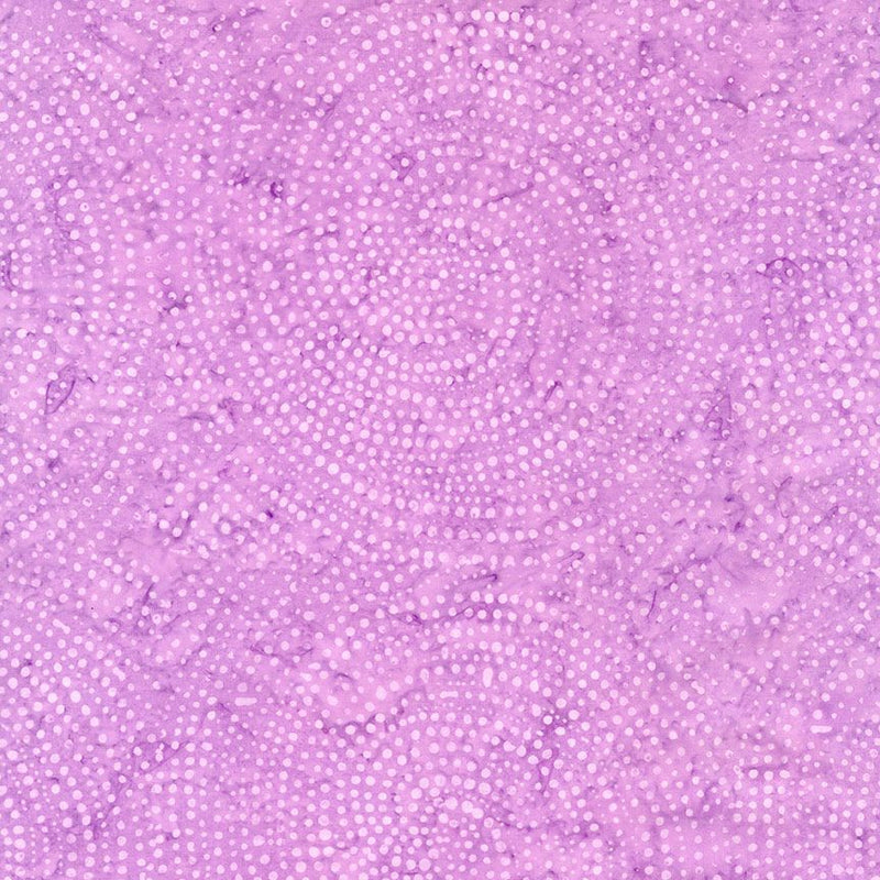 Tonga Batiks Pansy - Dotty Spiral Wisteria B2336 puuvillakangas batiikki, liilan ja vaaleanpunaisen sävyissä.