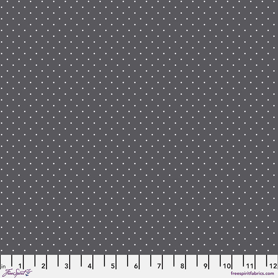 Tula Pink Tiny Dots Carbon -puuvillakangas, harmaa tausta ja pienet vaaleat pilkut.