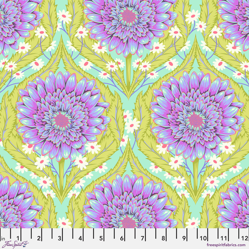 Daisy and Confused Nova: Tula Pinkin Untamed -kokoelman kukkakuvioinen puuvillakangas neonkorostuksilla ja geometrisilla kuvioilla.