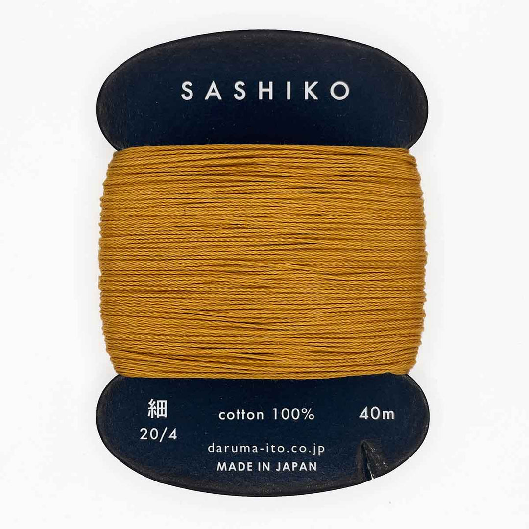 DARUMA Sashiko-kirjontalanka kortilla – Okrankeltainen #220, 40m japanilainen puuvillalanka