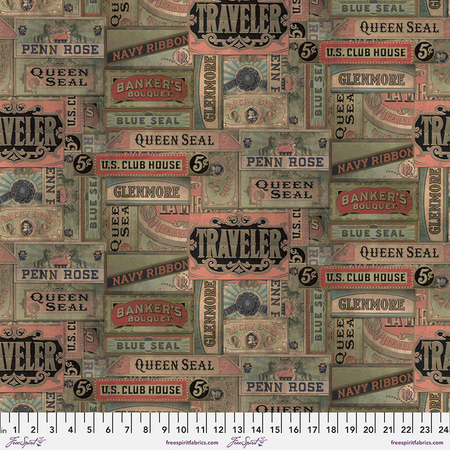 Tim Holtz Embark Cigarbox Canvas -puuvillapanamakangas, jossa vintage-tyylisiä sikarilaatikoiden etikettejä punaisen, vihreän ja beigen sävyissä.