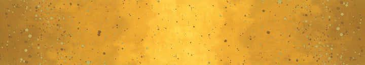 Lähikuva V&Co Ombre Galaxy Metallic Mustard 10873-213M -puuvillakankaasta, jossa on metallinhohto ja liukuvärjäys.