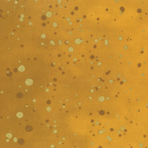 Lähikuva V&Co Ombre Galaxy Metallic Mustard 10873-213M -puuvillakankaasta, jossa on metallinhohto ja liukuvärjäys.