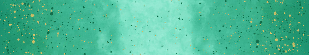 Lähikuva V&Co Ombre Galaxy Metallic Teal 10873-31M -puuvillakankaasta, jossa on metallinhohto ja liukuvärjäys.