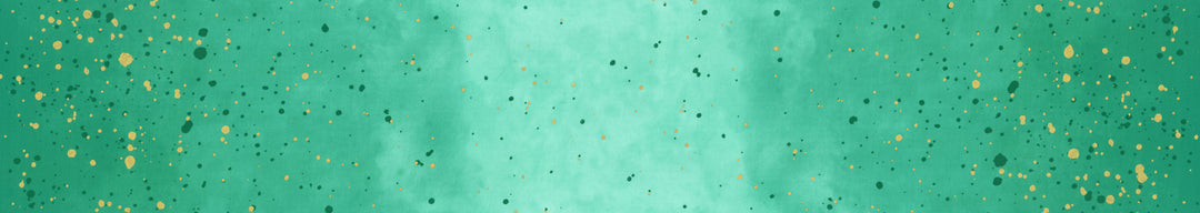 Lähikuva V&Co Ombre Galaxy Metallic Teal 10873-31M -puuvillakankaasta, jossa on metallinhohto ja liukuvärjäys.